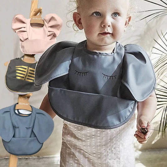 “Contemporary-styled Nordic Baby Bibs featuring an Angel Feed Pocket design” These bibs are not only chic but also practical, equipped with a waterproof and easy-to-clean feature. Crafted from soft fabric, they guarantee comfort for your little one.